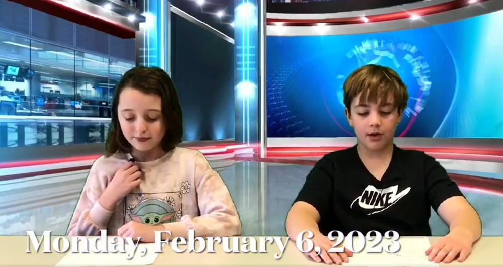Amelia and Liam reading the introduction of the news.