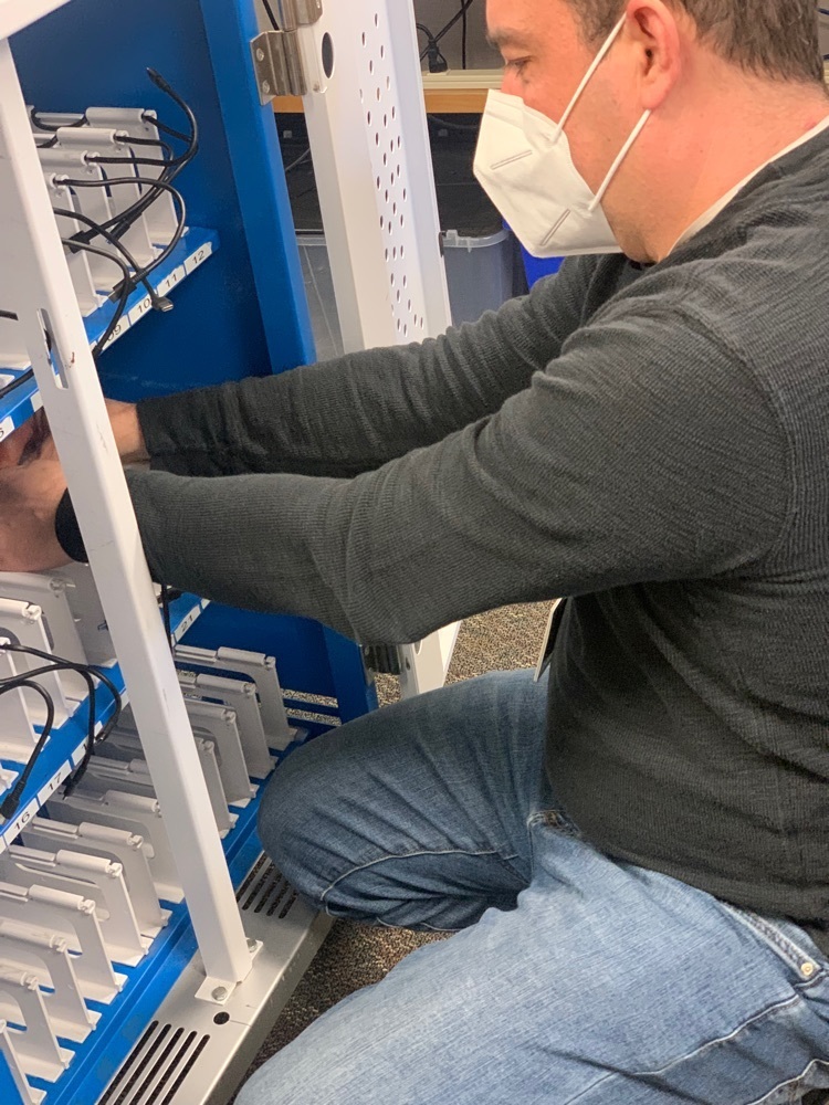 Greg adding cables to cart  