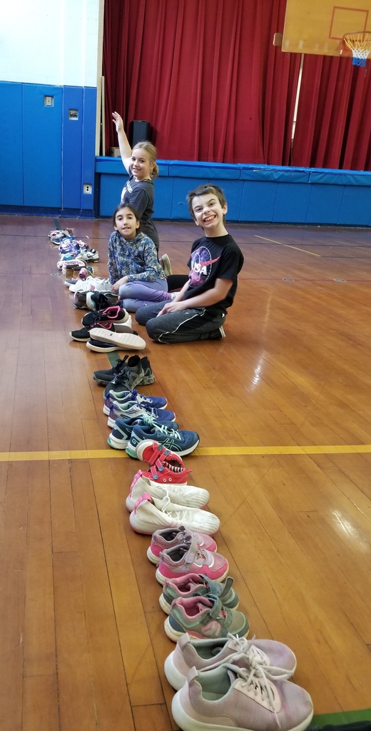 Mr. Fahy's PE PALs counting & organizing sneaker donations for The Wish Project